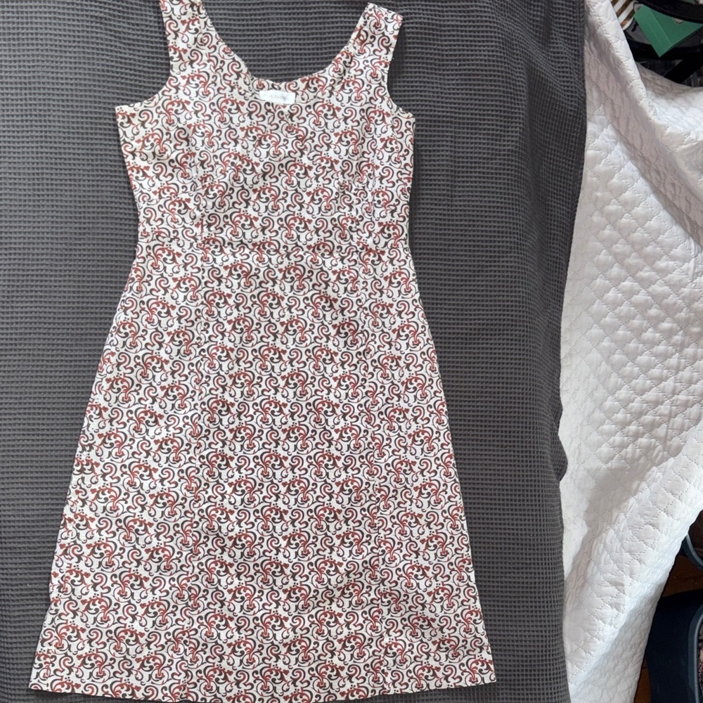 White Sleeveless Mini Dress with Red Scroll Print